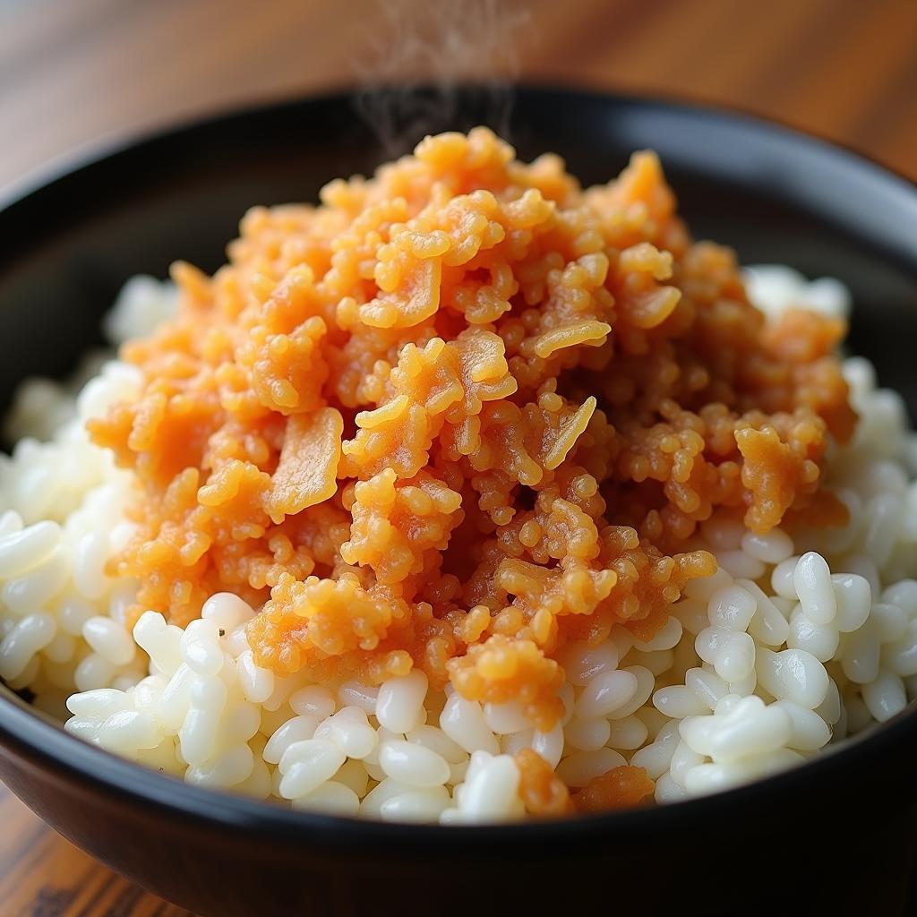 bát cơm trắng nóng hổi, rắc đều ruốc thịt lợn vàng ruộm, trông vô cùng hấp dẫn